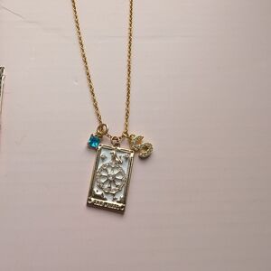 Gold Pendant Necklace with Blue Accent